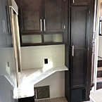 Need a place to work? The 3202WB Sanibel comes with a desk workstation located just inside the entry door for those who work from the campground or wish to stay connected online. The entry is also equipped with additional storage and a tall coat closet.